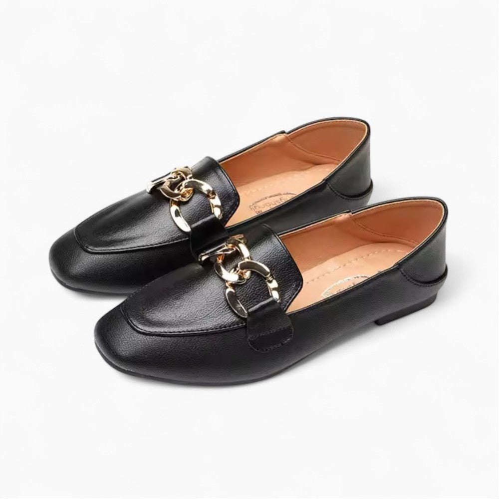 Mocassin en cuir noir à boucle dorée